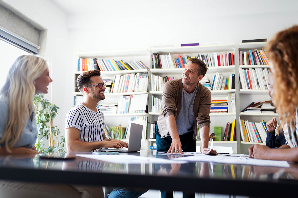 Successful company with happy employees in modern office
